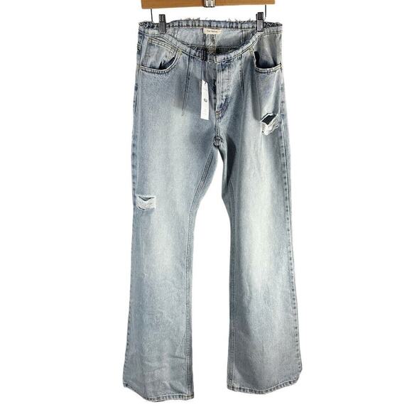 The Mannei Denim - The MANNEI Low Rise Distressed Frayed Wide Leg Jeans
FR 40 Button Fly